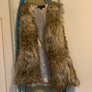 This brand for this item is called New Look. It’s a small and it’s made in china